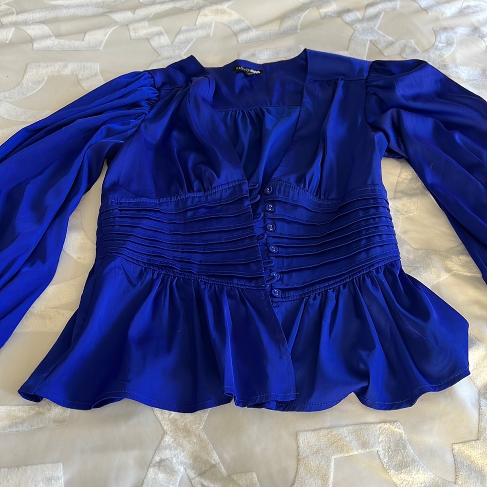 Beautiful peplum top with cinched waist